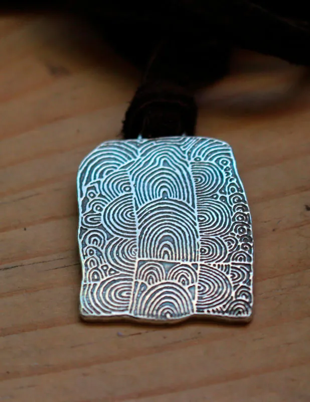 Cairn of Gavrinis, Neolithic engraved stone with spirals necklace in silver