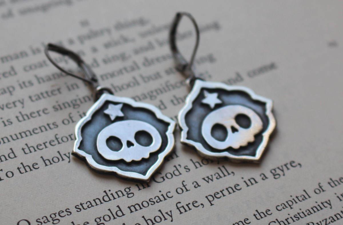 Calaverita, Mexican traditional skull and star earrings in silver