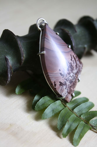 Chiricahua, Native American tribe pendant in silver and Apache rhyolite