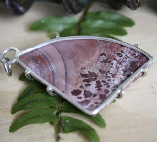 Chiricahua, Native American tribe pendant in silver and Apache rhyolite