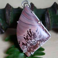 Chiricahua, Native American tribe pendant in silver and Apache rhyolite