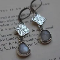 Clervie, Celtic flower earrings in silver and moonstone