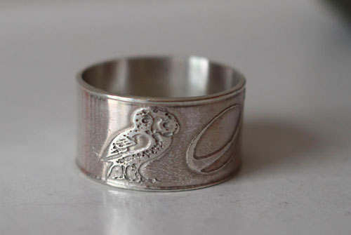 Conviction, personal symbols ring in sterling silver