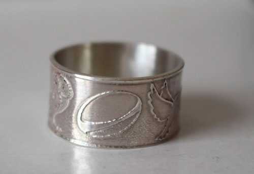 Conviction, personal symbols ring in sterling silver