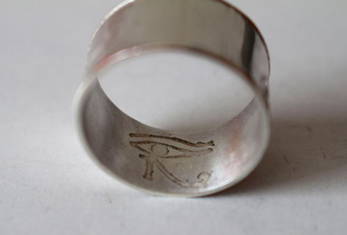 Conviction, personal symbols ring in sterling silver