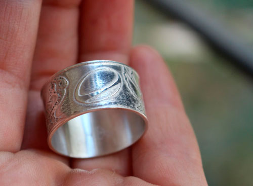 Conviction, personal symbols ring in sterling silver