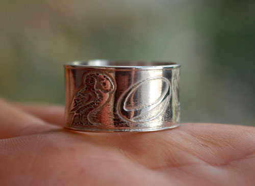 Conviction, personal symbols ring in sterling silver