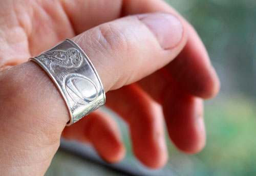 Conviction, personal symbols ring in sterling silver