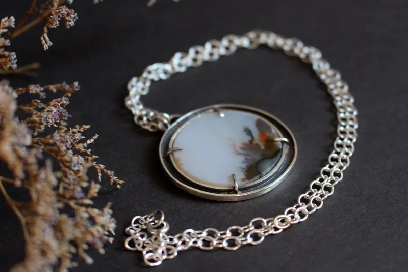 Cradled by the wind, meditative landscape necklace in silver and dendritic agate