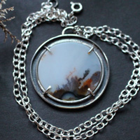 Cradled by the wind, meditative landscape necklace in silver and dendritic agate