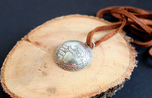 Cave painting, prehistoric hunting scene necklace in sterling silver