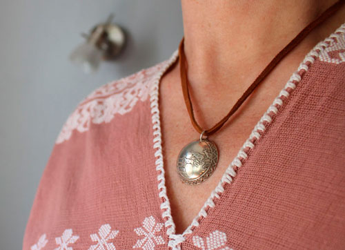 Cave painting, prehistoric hunting scene necklace in sterling silver