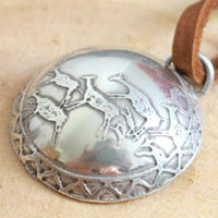 Cave painting, prehistoric hunting scene necklace in sterling silver