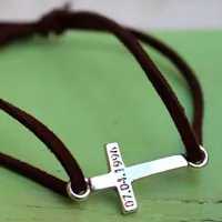 Decision, engraved cross bracelet in silver and suede cord