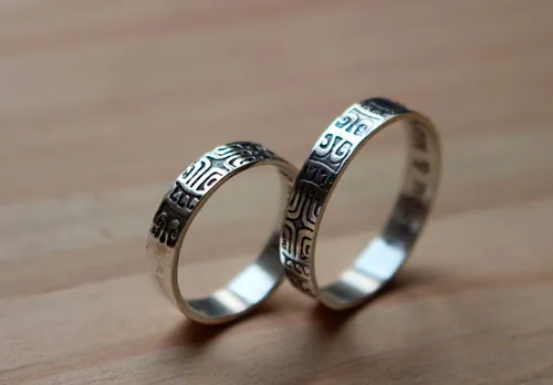 Diapason wedding bands, Polynesian symbol ring in silver