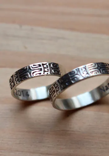 Diapason wedding bands, Polynesian symbol ring in silver