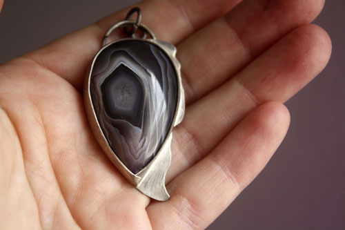Eagle eye, raptor head pendant in silver and Botswana agate