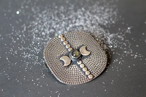 Equinox, moon and astronomy brooch in silver and labradorite