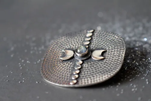 Equinox, moon and astronomy brooch in silver and labradorite
