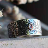 Eternity, pomegranate ring in silver and diamond