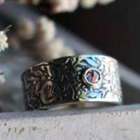 Eternity, pomegranate ring in silver and diamond