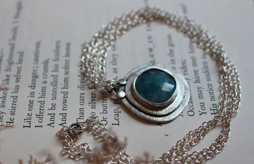 Eye of the sea, marine life necklace in silver and aquamarine