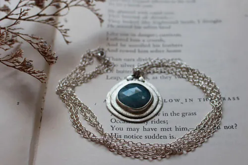 Eye of the sea, marine life necklace in silver and aquamarine