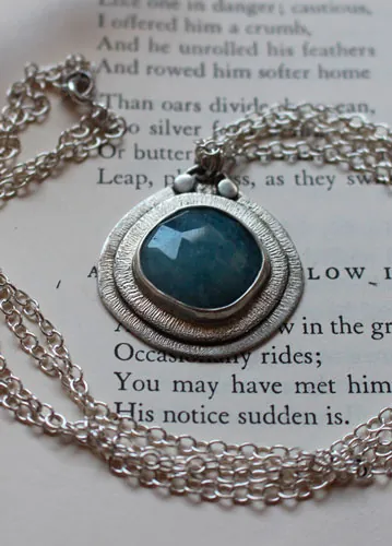 Eye of the sea, marine life necklace in silver and aquamarine