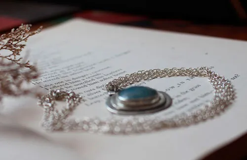 Eye of the sea, marine life necklace in silver and aquamarine