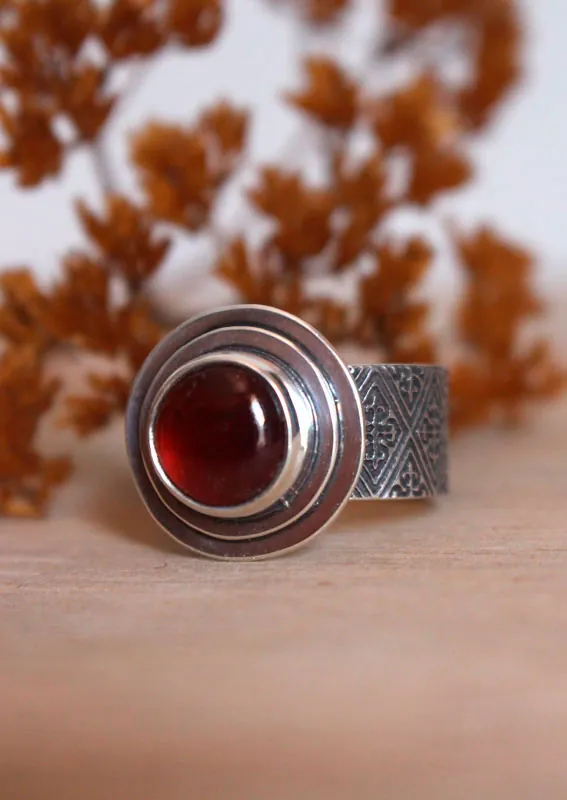 Faith, medieval fleur-de-lis ring in silver and garnet