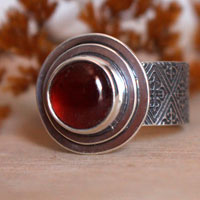 Faith, medieval fleur-de-lis ring in silver and garnet