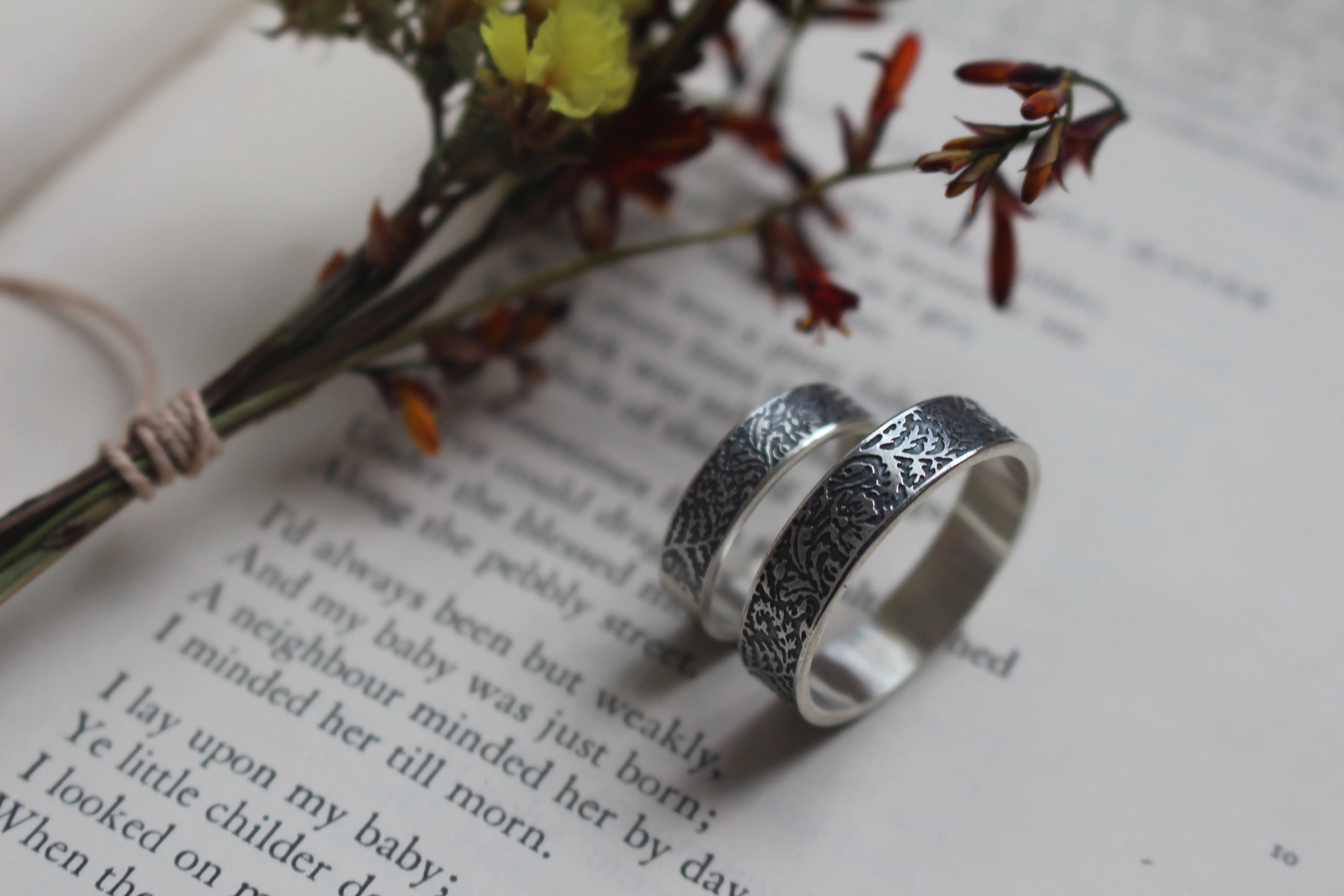 Fern and poppy wedding bands, botanical encounter ring in silver