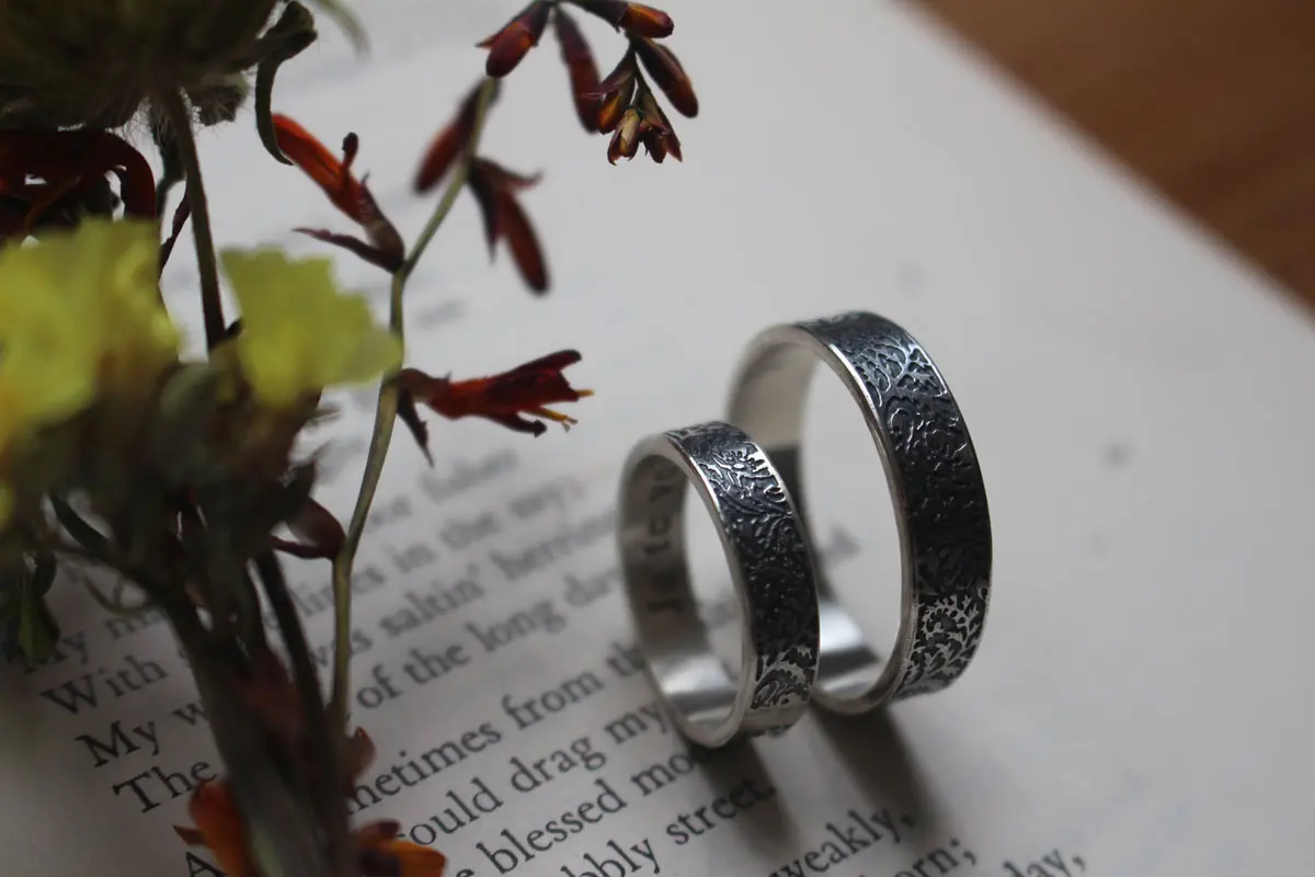 Fern and poppy wedding bands, botanical encounter ring in silver