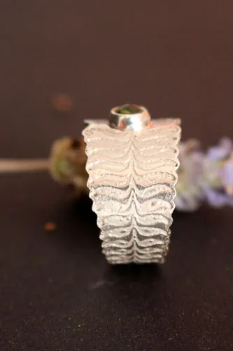 Fern flower, legendary from Eastern Europe ring in silver and peridot
