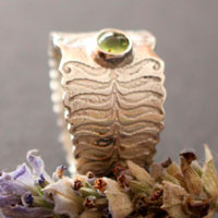 Fern flower, legend from eastern europe ring in sterling silver and peridot