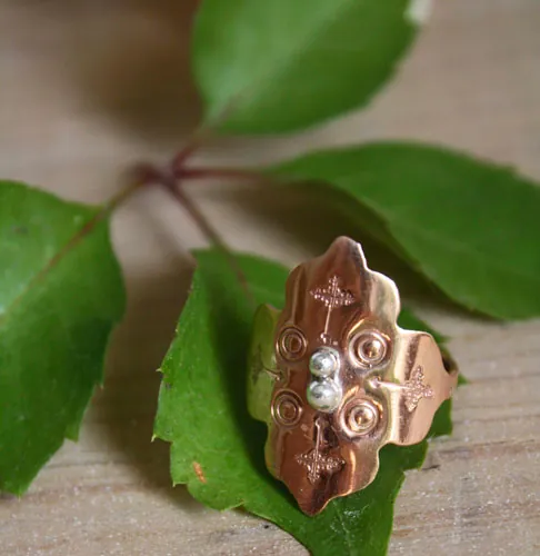 Fire rose, medieval rosette ring in silver and copper