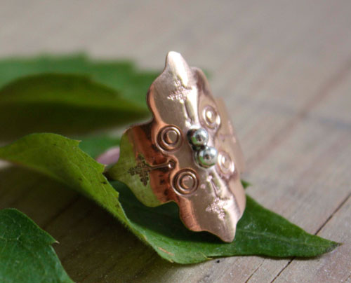 Fire rose, medieval rosette ring in silver and copper