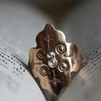 Fire rose, medieval rosette ring in silver and copper