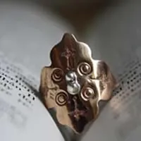Fire rose, medieval rosette ring in silver and copper