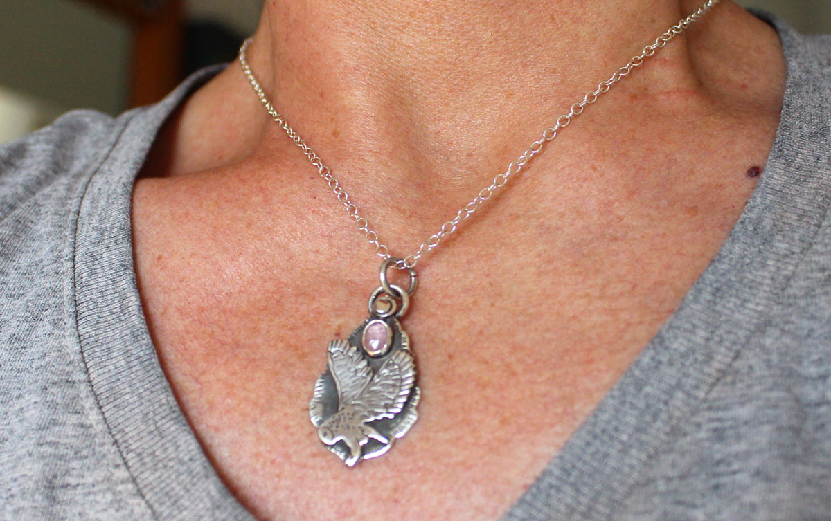 Flight, owl necklace in silver and pink sapphire