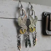 Flight at twilight, Celtic owl earrings in silver, brass and moss agate