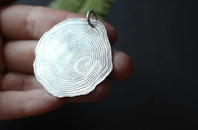 Forever, memory engraved in the tree’s age rings pendant in silver