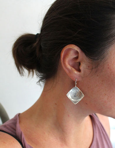 Fossil, ammonite earrings in sterling silver”