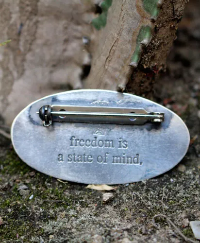 Freedom is a state of mind, bear and rabbit brooch in silver
