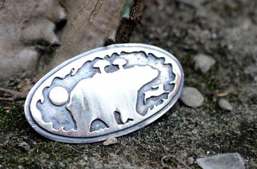 Freedom is a state of mind, bear and rabbit brooch in silver