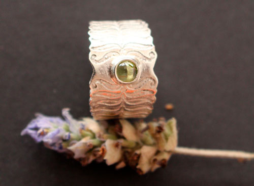 Fern flower, legend from Eastern Europe ring in sterling silver and peridot 