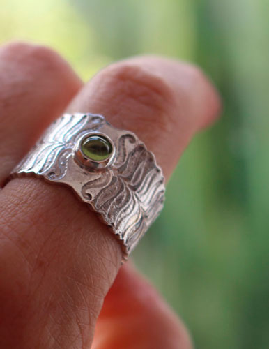 Fern flower, legend from Eastern Europe ring in sterling silver and peridot 