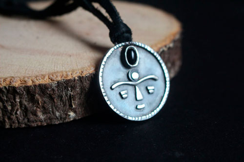 Gaia, African tribal mask necklace in silver and onyx