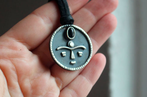 Gaia, African tribal mask necklace in silver and onyx