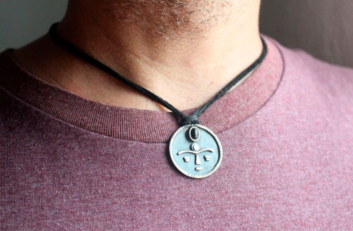 Gaia, African tribal mask necklace in silver and onyx